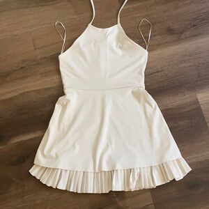 Reformation eco move active wear pleated skirt holster neck dress